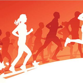 A big group of running people in a autumn race with plenty of copy space. A big group of running people in a autumn race with plenty of copy space.